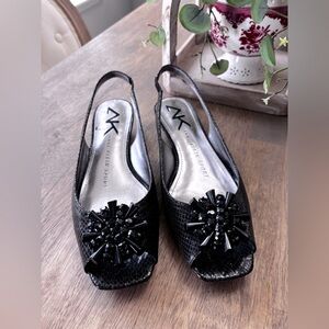 Anne Klein Sport black snakeskin sling back flat